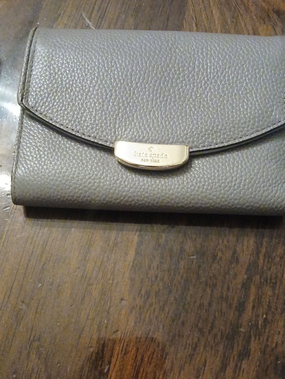 kate spade Gray Pebbled Leather Wallet with Gold Hardware